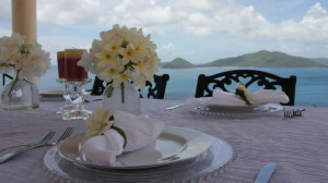Caribbean wedding - table setting with Guana Island in the background